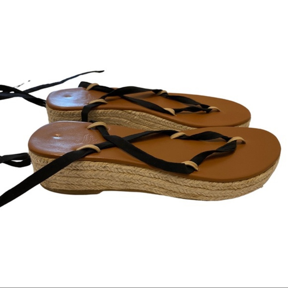 Sseko wedge sandals caramel size 6 with 3 sets of ribbons. Worn once.